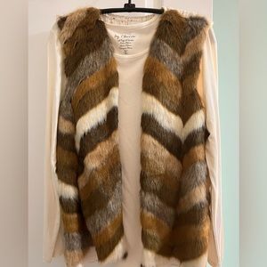 Chicos size 0 cute vest never worn.